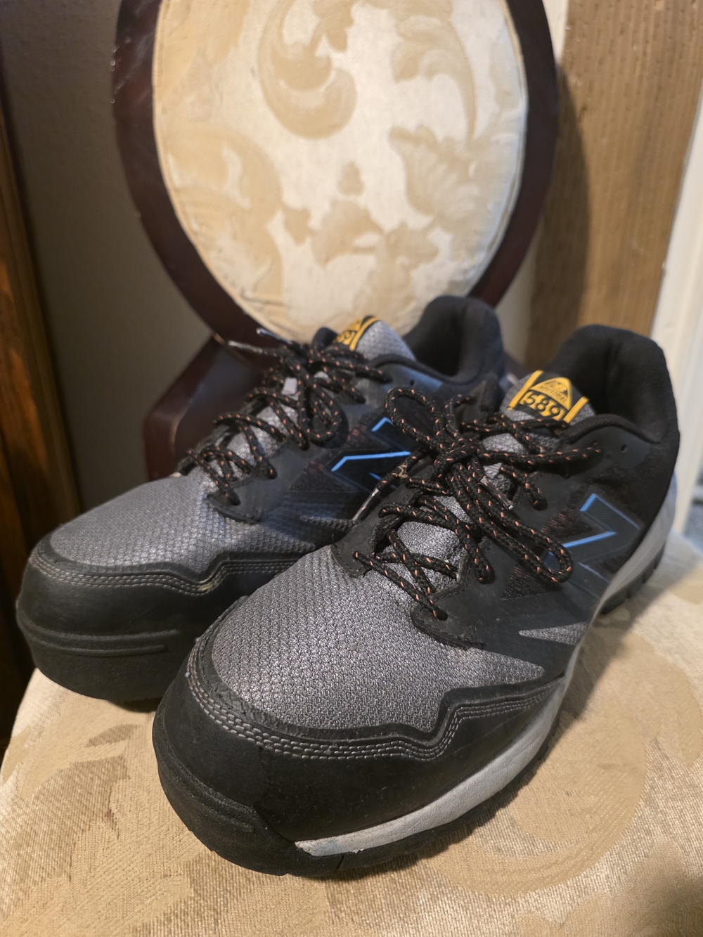 New Balance Gray and Black Men's Athletic Sneakers with Blue Accents